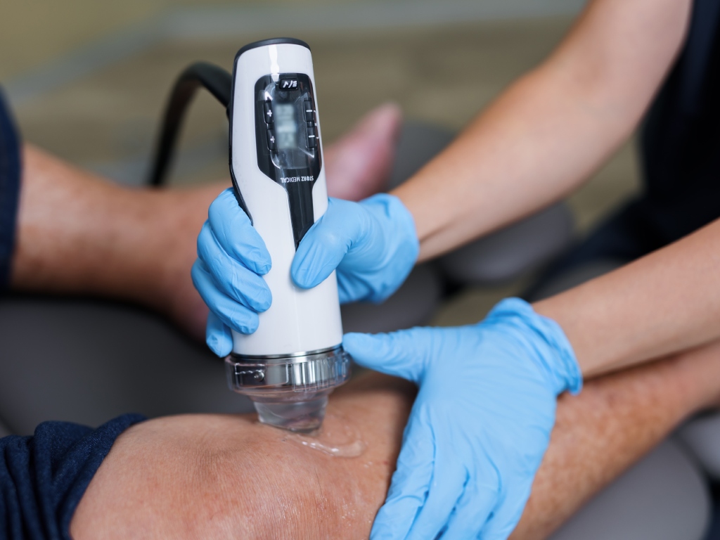 extracorporeal shockwave therapy on patient with knee osteoarthritis