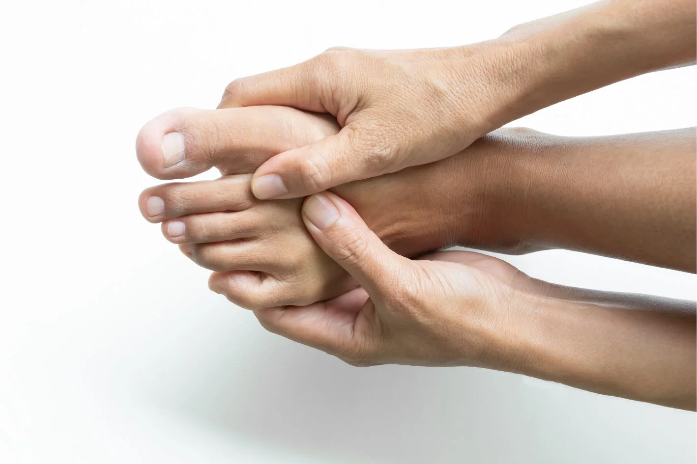 Person suffering from pain on top of the foot