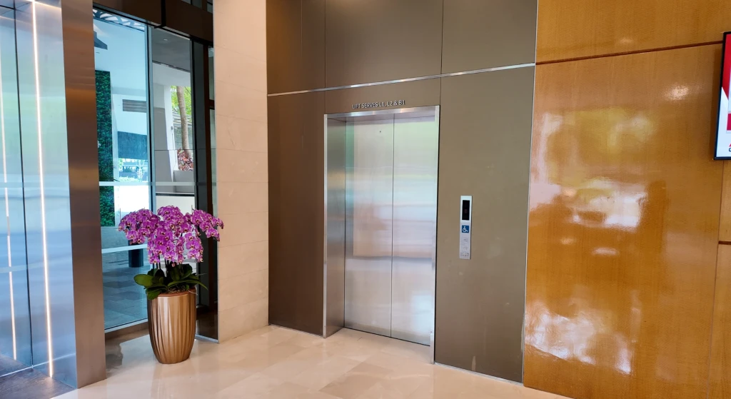Take the main lobby lift up to Level 2 (this lift only serves L1, L2 and B1).