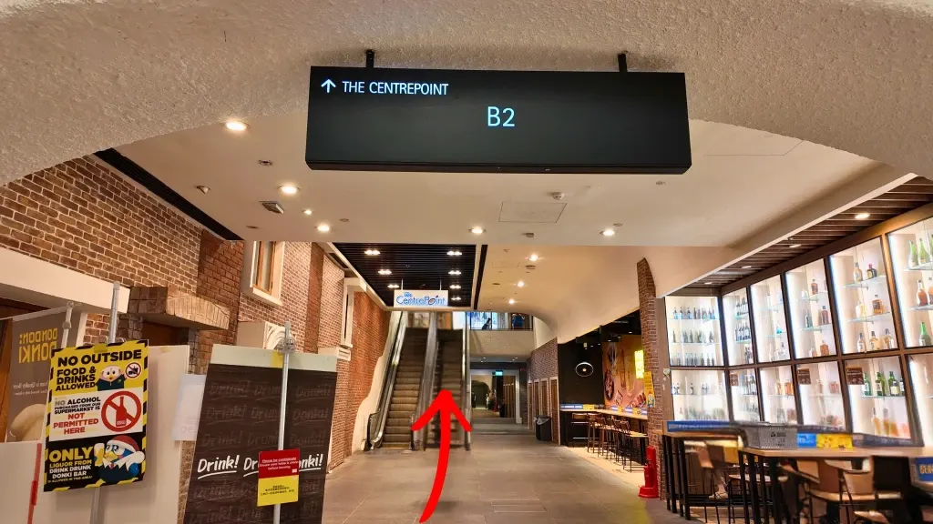 Take the escalator up into The Centrepoint.